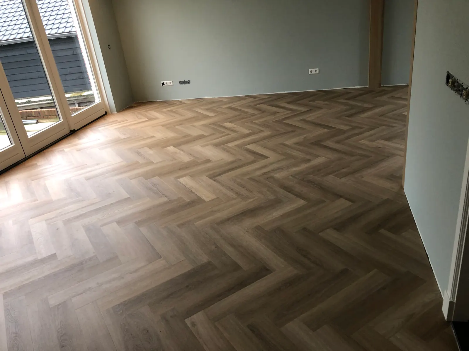 Visgraat tot aan de balkondeuren