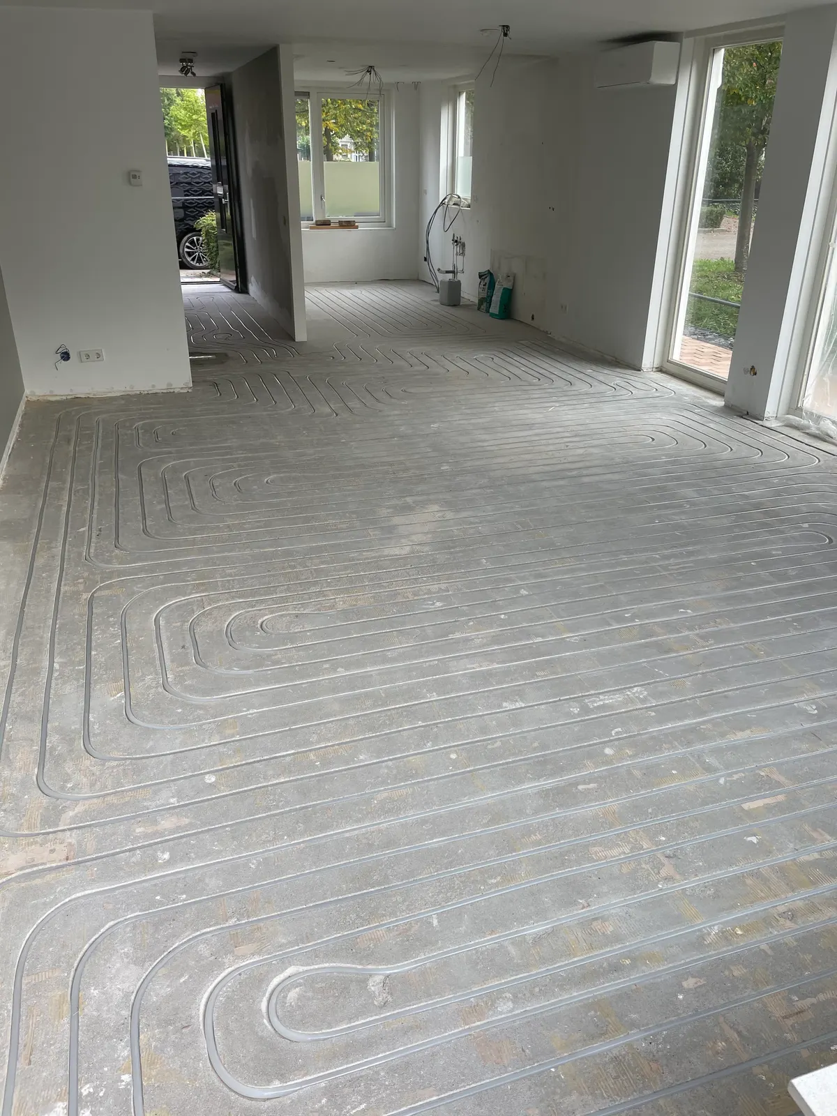 Vloerverwarming ingefreesd in de dekvloer